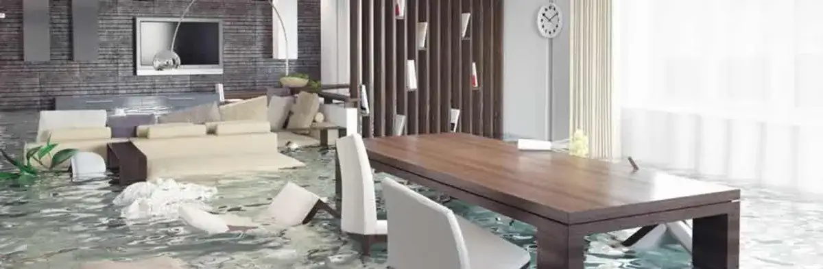 home interior affected by water damage with flooded floors and displaced furniture in Seattle, WA